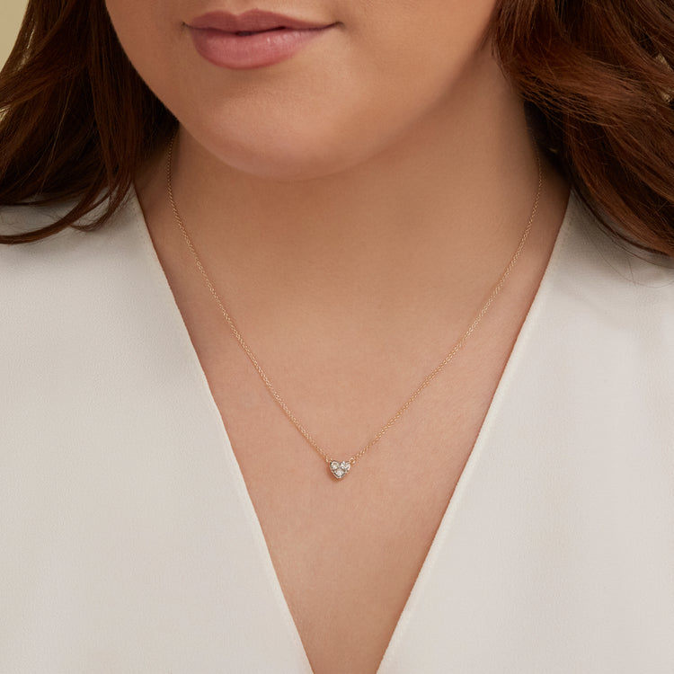 Image of 10K Yellow Gold Piece Of My Heart Diamond Necklace on Models Neck