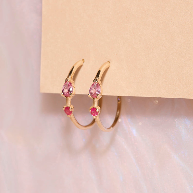 Stone and Strand 10K Yellow Gold Pink Power Ruby and Pink Sapphire Hoops Editorial Image