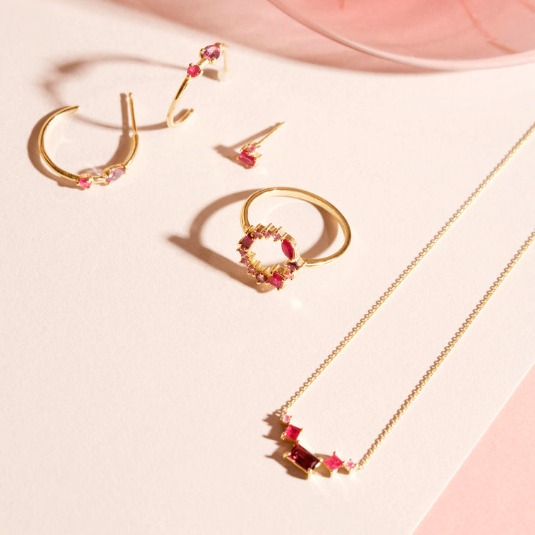 Still life image of Pink Power Stud with Stone and Strand solid gold jewelry