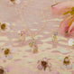 Still life image of Pink Wildflower Huggie with Gemstones with Stone and Strand solid gold jewelry