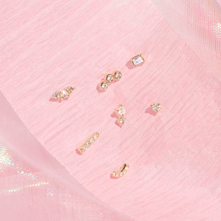 Still life image of Princess and Round Diamond Piercing Earring with Stone and Strand solid gold jewelry