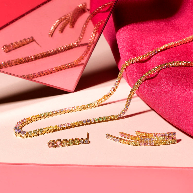 Still life image of Rainbow Bright Drop Earrings with Stone and Strand solid gold jewelry