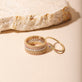 Still life image of Rainbow Sapphire Pave Eternity Band with Stone and Strand solid gold jewelry