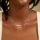 Model wearing Say My Name Script Necklace with solid gold Stone and Strand jewelry