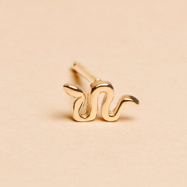 Stone and Strand 10K Yellow Gold Serpent Stud Editorial Image