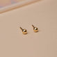 Stone and Strand 14K Yellow Gold Small Gold Bead Earring Editorial Image