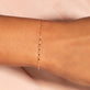 Image of 10K Yellow Gold Sparkle Chain Bracelet on Models Arm