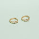 Stone and Strand 14K Yellow Gold Dainty Sparkle Diamond Cluster Huggies Editorial Image