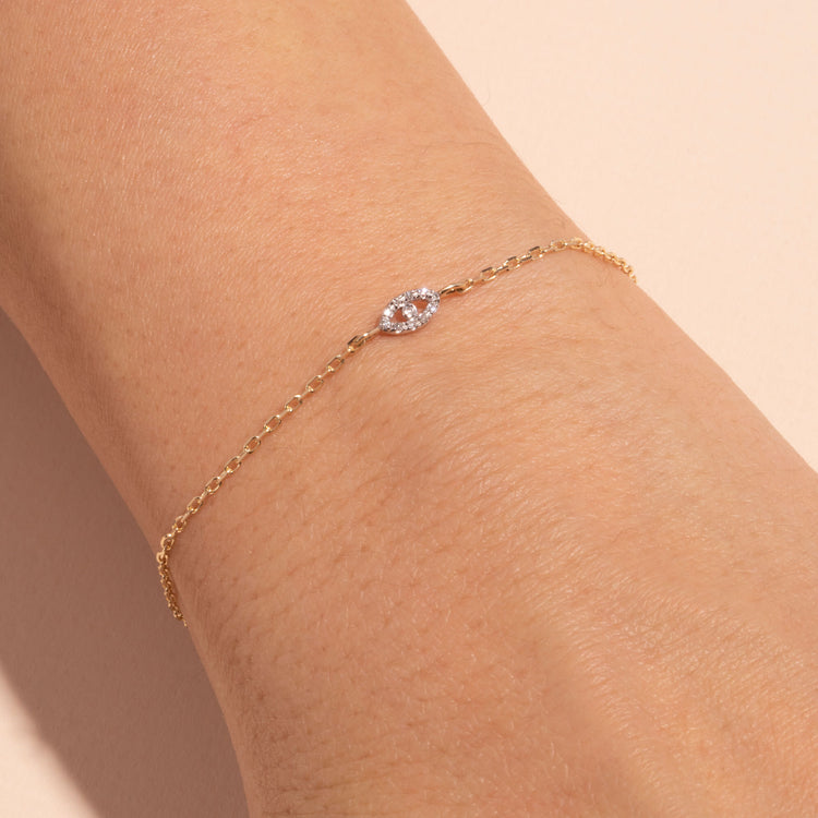 Image of 10K Yellow Gold Teeny Diamond Evil Eye Bracelet on Models Arm