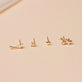 Still life image of Tiny Diamond Gold North Star Stud with Stone and Strand solid gold jewelry