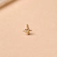 Stone and Strand 10K Yellow Gold Tiny Diamond Gold North Star Stud Editorial Image