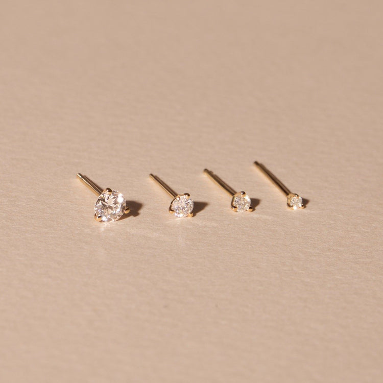 Still life image of Teeny Diamond Stud with Stone and Strand solid gold jewelry