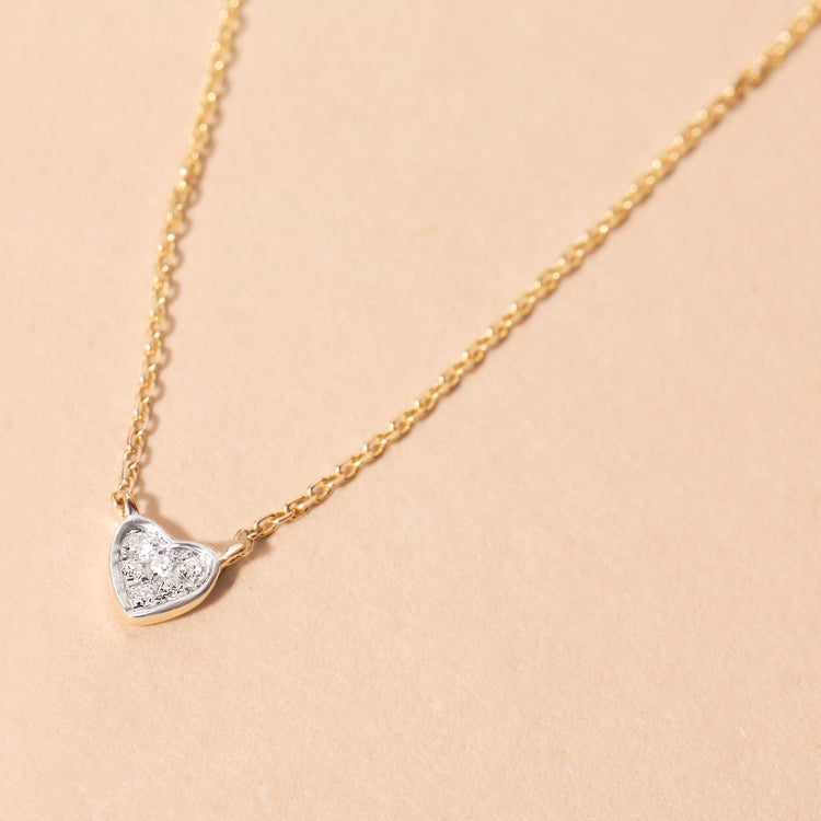 Stone and Strand 14K Yellow Gold Teeny Pave Heart Necklace Editorial Image