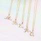 Teeny Pearl Cursive Initial Necklace