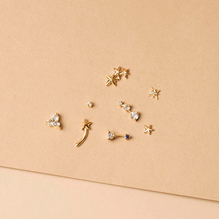 Still life image of Teeny White Topaz Stud with Stone and Strand solid gold jewelry