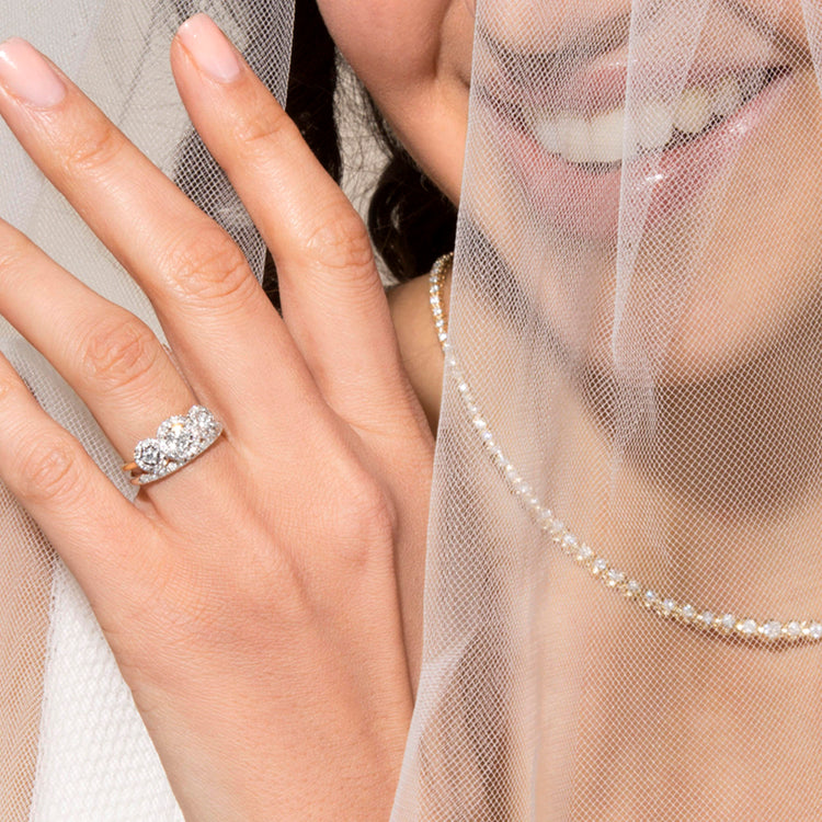Model wearing The Josephine Ring with solid gold Stone and Strand jewelry