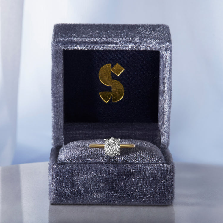 Still life image of The Sophia Ring In Yellow Gold with Stone and Strand jewelry box