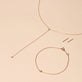 Still life image of Tiny Diamond Lariat Necklace with Stone and Strand solid gold jewelry