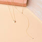 Still life image of Tiny Diamond Lariat Necklace with Stone and Strand solid gold jewelry