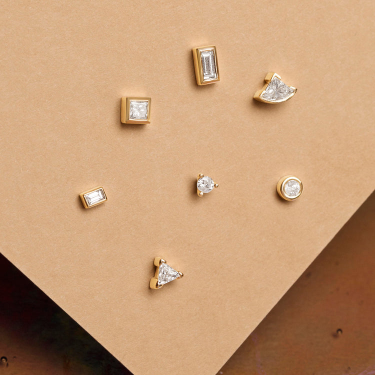 Still life image of Tiny Diamond Stud with Stone and Strand solid gold jewelry