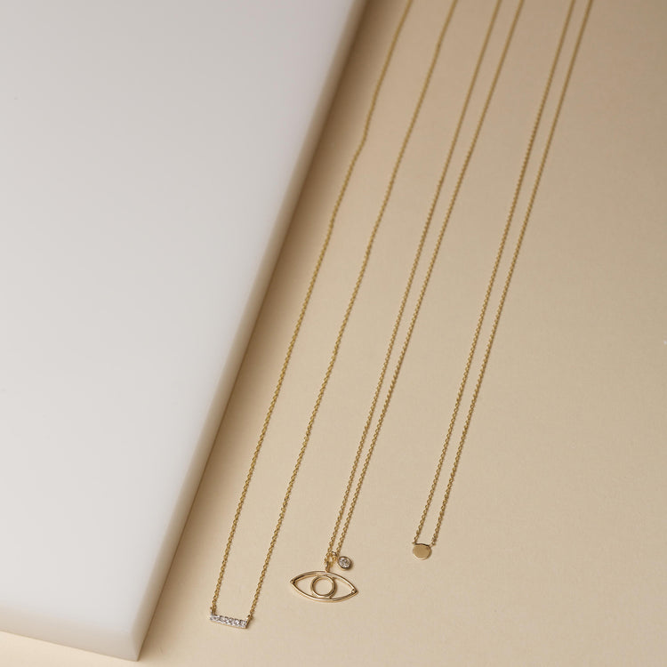 Stone and Strand 10K Yellow Gold Tiny Dot Necklace Editorial Image