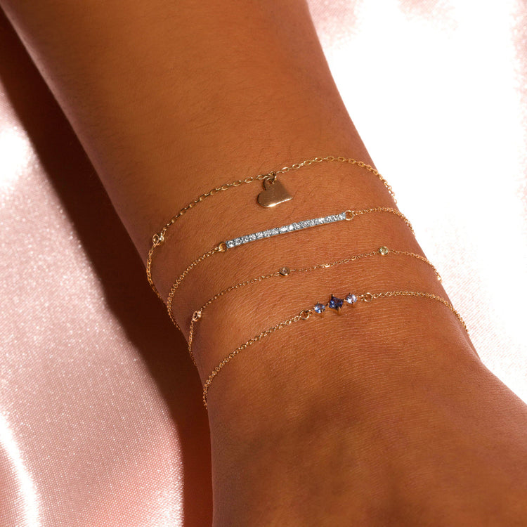 Image of 14K Yellow Gold Teeny Pave Diamond Bar Bracelet on Models Arm