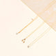Still life image of Tiny Pave Diamond Star Necklace with Stone and Strand solid gold jewelry