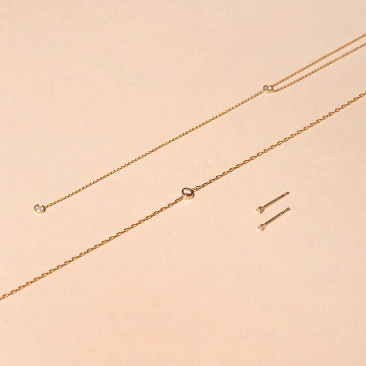 Still life image of Medium Round Diamond Bracelet with Stone and Strand solid gold jewelry