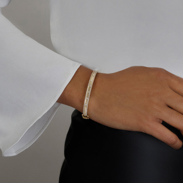Image of 14K Yellow Gold Together Forever Deluxe Diamond Bangle on Models Arm
