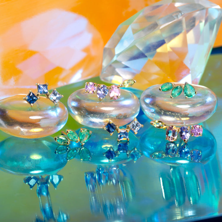 Still life image of True Blue Sapphire Climbers with Stone and Strand solid gold jewelry