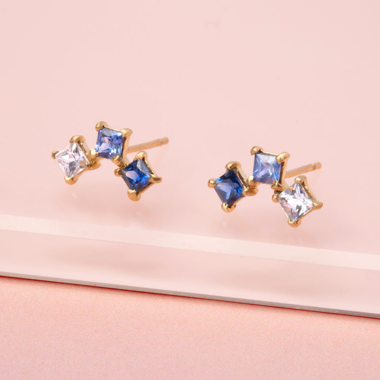Stone and Strand 10K Yellow Gold True Blue Sapphire Climbers Editorial Image