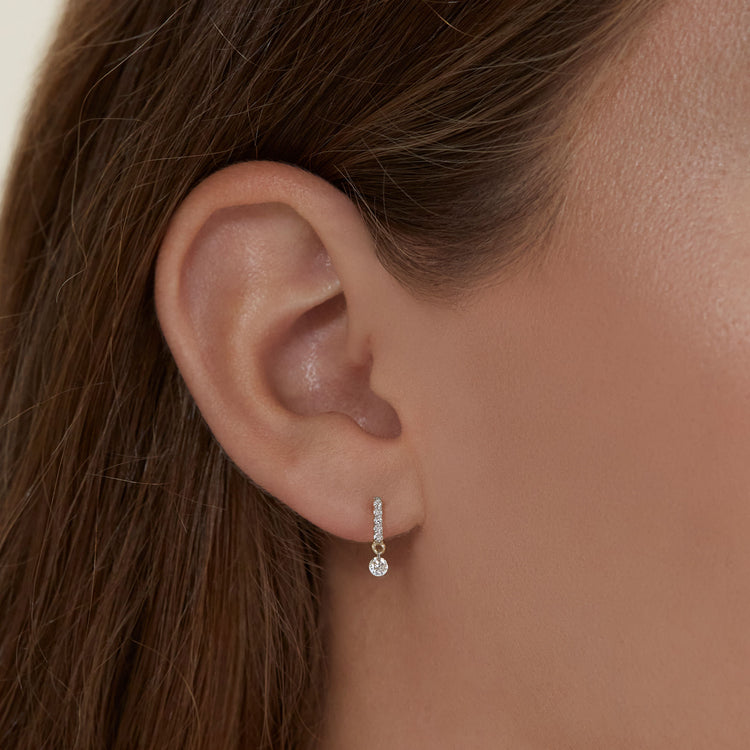 Image of 10K Yellow Gold Twinkle Diamond Drop Studs on Models Ear