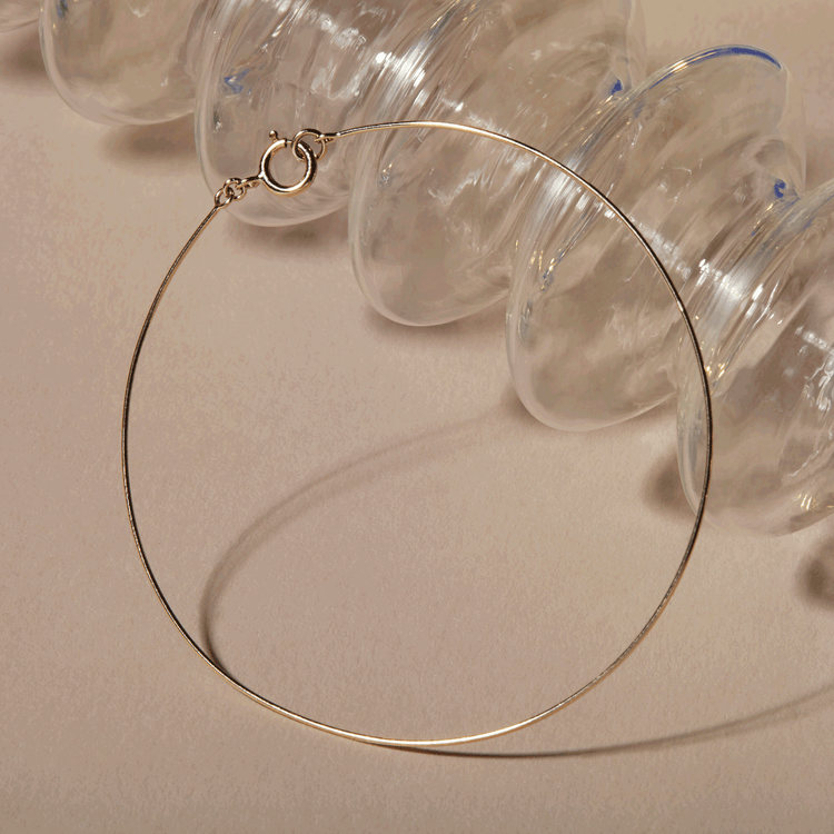 Stone and Strand 10K Yellow Gold Ultra Fine Bangle Editorial Image