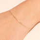 Image of 10K Yellow Gold Ultra Fine Bangle on Models Arm