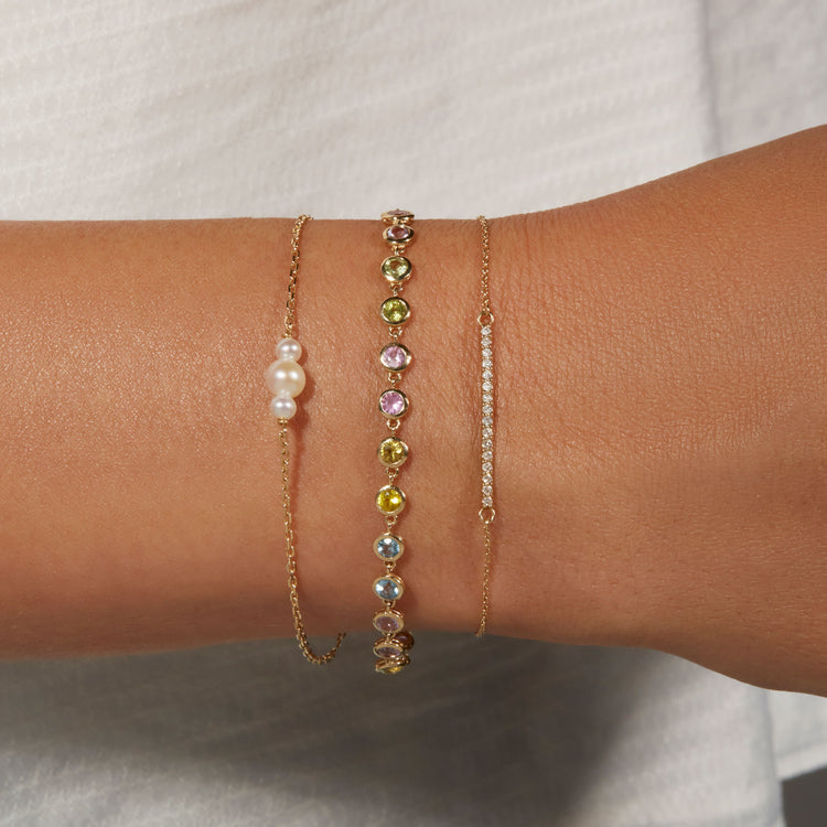 Image of 10K Yellow Gold Unicorn Bubble Tennis Bracelet with Stone and Strand Bracelets