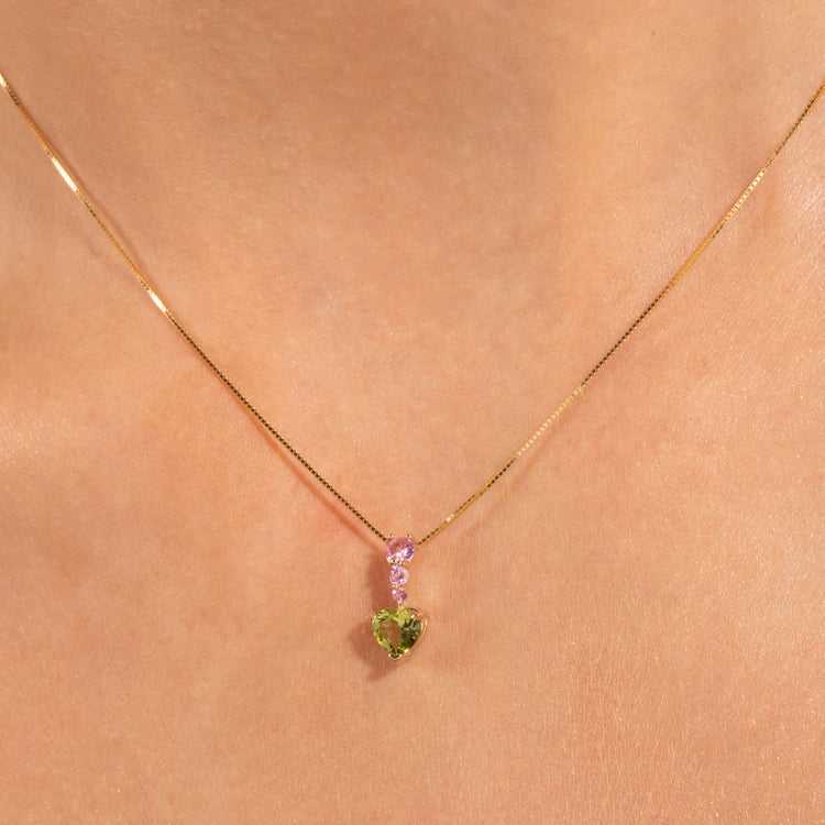 Image of 10K Yellow Gold Watermelon Candyland Necklace with Pink Sapphire and Peridot on Models Neck