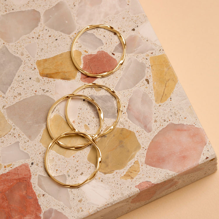 Stone and Strand 10K Yellow Gold Wavy Band Editorial Image