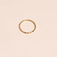 Stone and Strand 14K Yellow Gold Dainty Wavy Clicker Ring Editorial Image