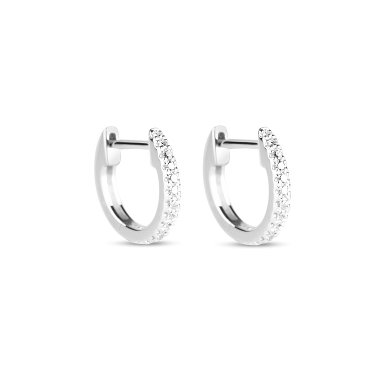 Stone and Strand 10K White Gold Dainty White Diamond Pave Huggie Earrings Side Image