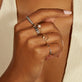 Model wearing White Gold Jelly Beans Ring with solid gold Stone and Strand jewelry