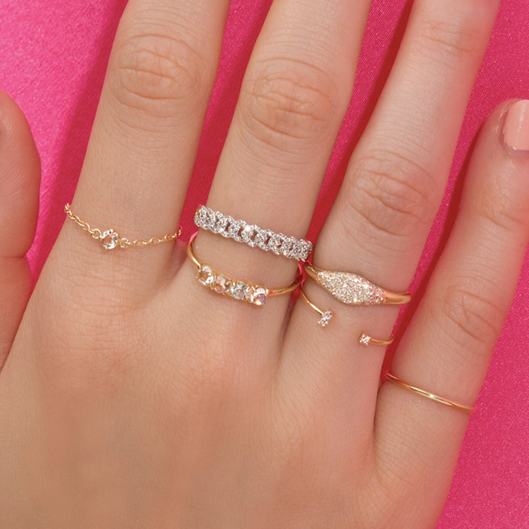 Chain Reaction Topaz Ring