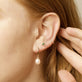 Image of 14K Yellow Gold Elliptical Pearl Huggies with Stone and Strand Earrings