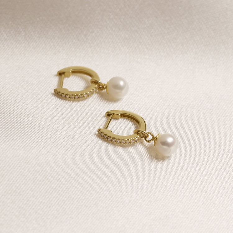 Stone and Strand 10K Yellow Gold Freshwater Droplet Pearl Pave Diamond Huggies Editorial Image