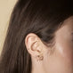 gold huggie earrings with pearl