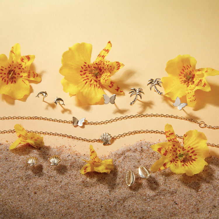 Still life image of Butterfly Studs with Stone and Strand solid gold jewelry