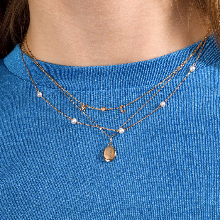 Image of 14K Yellow Gold Secret's Safe Locket with Stone and Strand Necklaces